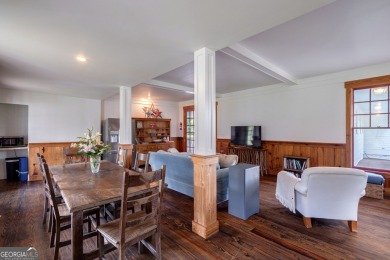 Nestled along the shores of Lake Oconee, this extraordinary