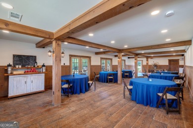 Nestled along the shores of Lake Oconee, this extraordinary