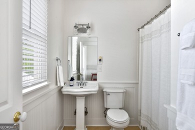 Nestled along the shores of Lake Oconee, this extraordinary