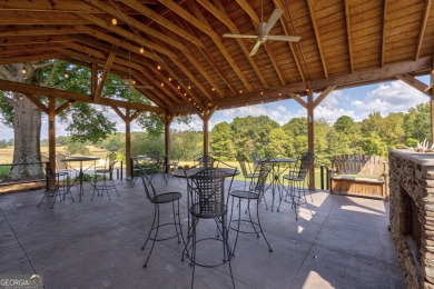 Nestled along the shores of Lake Oconee, this extraordinary