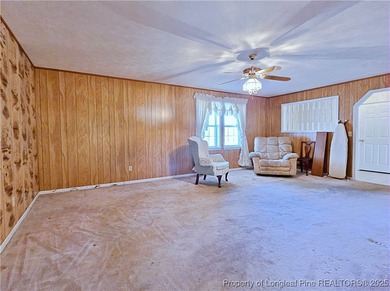 This spacious 4 bedroom, 3 bath brick ranch offers serene lake