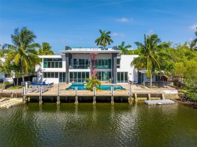 Discover luxury in this custom modern home on a premier Las Olas
