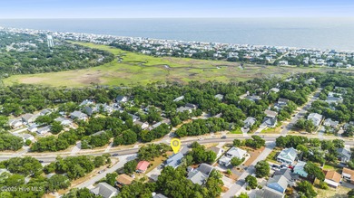 This spacious coastal home sits in the middle of a generous