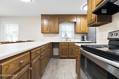 This spacious coastal home sits in the middle of a generous