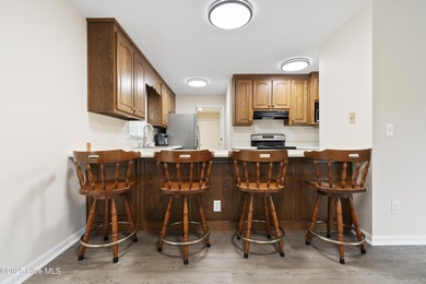 This spacious coastal home sits in the middle of a generous