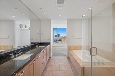 Experience luxury high-rise living at its finest in this