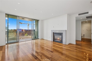 Experience luxury high-rise living at its finest in this