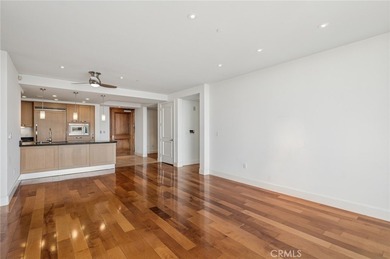 Experience luxury high-rise living at its finest in this