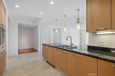 Experience luxury high-rise living at its finest in this