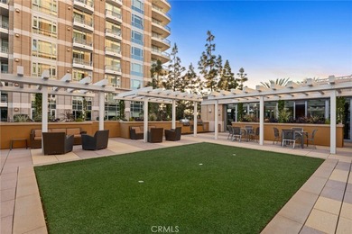 Experience luxury high-rise living at its finest in this