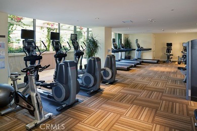 Experience luxury high-rise living at its finest in this