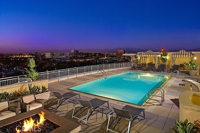 Experience luxury high-rise living at its finest in this