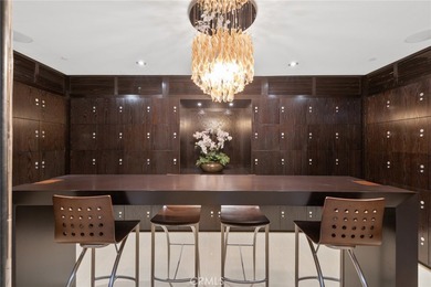 Experience luxury high-rise living at its finest in this