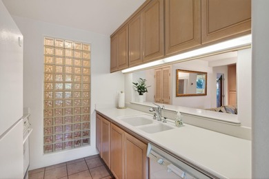 Nestled in the coveted El Escorial Villas just steps from East