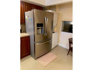 Large 2-bedroom 2-bathroom condominium on the golf course. Guard