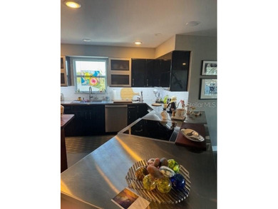 Nestled just two blocks from the lively heart of downtown St