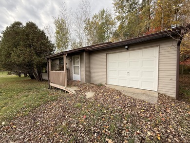 This 2 bedroom one bath with an attached garage.The home is