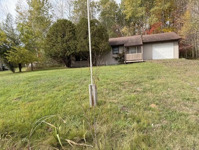 This 2 bedroom one bath with an attached garage.The home is