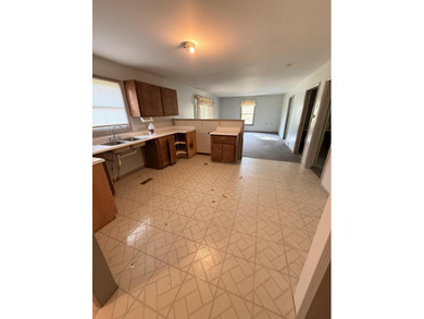 This 2 bedroom one bath with an attached garage.The home is