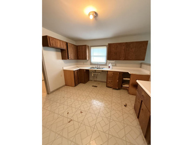 This 2 bedroom one bath with an attached garage.The home is