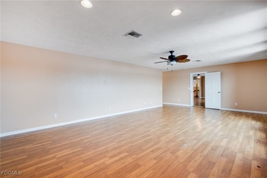 Welcome to a truly rare Cape Coral waterfront estate located on