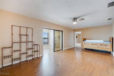 Welcome to a truly rare Cape Coral waterfront estate located on