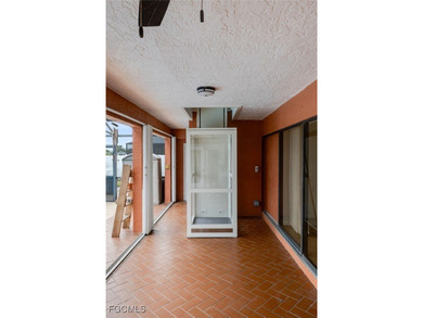 Welcome to a truly rare Cape Coral waterfront estate located on