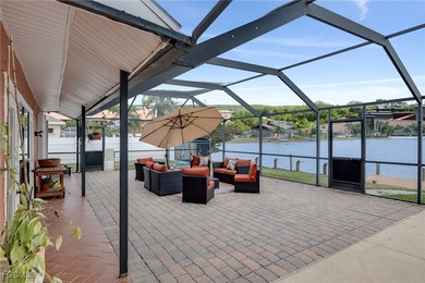 Welcome to a truly rare Cape Coral waterfront estate located on