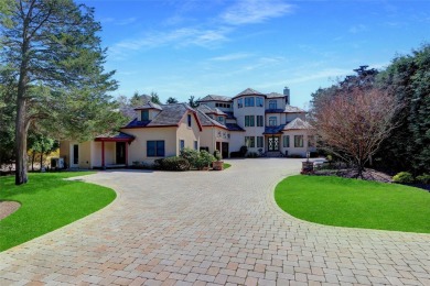 Experience luxury coastal living in this breathtaking 3-level