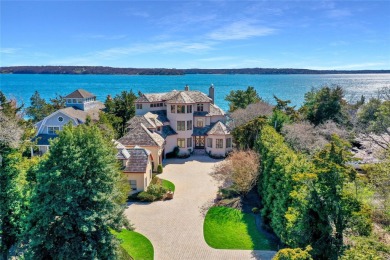 Experience luxury coastal living in this breathtaking 3-level