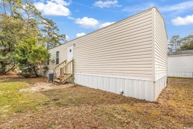 Discover the charm of coastal living at 2100 Hwy 15 Lot 2