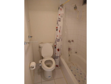 GATED 1 BDR 1.5 BATH TILED UNIT WITH WATER VIEW. 1 BLOCK TO
