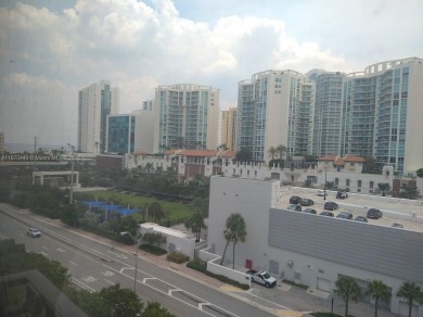 GATED 1 BDR 1.5 BATH TILED UNIT WITH WATER VIEW. 1 BLOCK TO