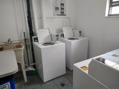 GATED 1 BDR 1.5 BATH TILED UNIT WITH WATER VIEW. 1 BLOCK TO