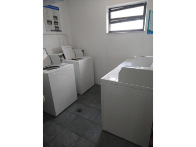 GATED 1 BDR 1.5 BATH TILED UNIT WITH WATER VIEW. 1 BLOCK TO