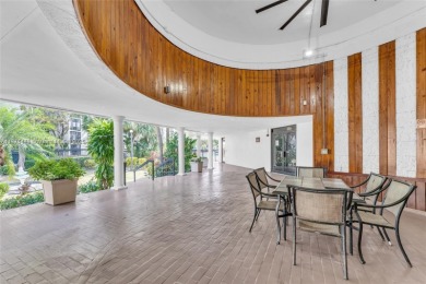 GATED 1 BDR 1.5 BATH TILED UNIT WITH WATER VIEW. 1 BLOCK TO