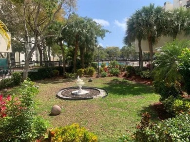 GATED 1 BDR 1.5 BATH TILED UNIT WITH WATER VIEW. 1 BLOCK TO