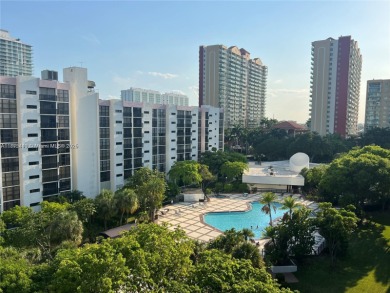 GATED 1 BDR 1.5 BATH TILED UNIT WITH WATER VIEW. 1 BLOCK TO