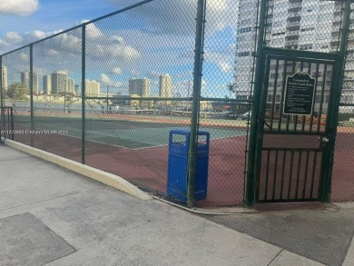 GATED 1 BDR 1.5 BATH TILED UNIT WITH WATER VIEW. 1 BLOCK TO