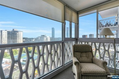 Fabulous 2 bed/2bath on high floor with glass enclosed terrace