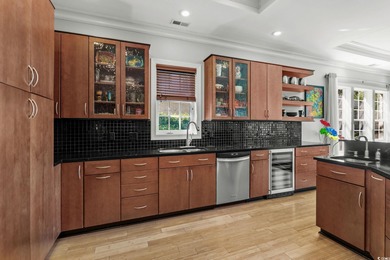 This all-brick custom-built home in the gated community of