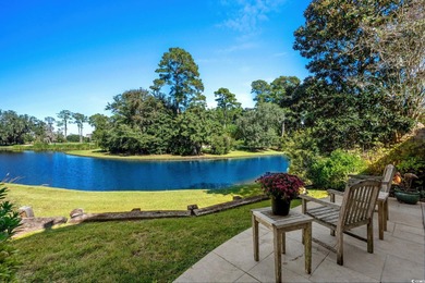 This all-brick custom-built home in the gated community of