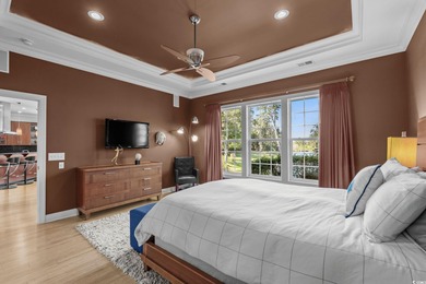 This all-brick custom-built home in the gated community of