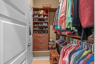 This all-brick custom-built home in the gated community of