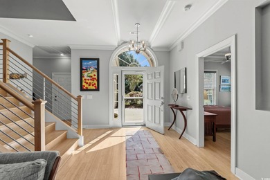 This all-brick custom-built home in the gated community of