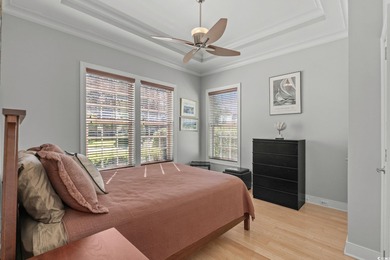 This all-brick custom-built home in the gated community of