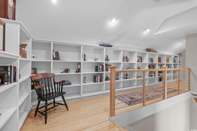 This all-brick custom-built home in the gated community of