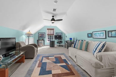 This all-brick custom-built home in the gated community of