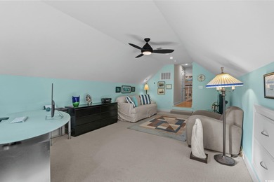 This all-brick custom-built home in the gated community of