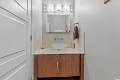 This all-brick custom-built home in the gated community of